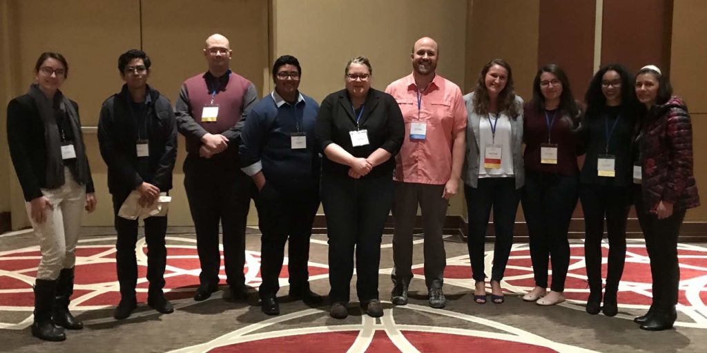 Travel grants winners in a line